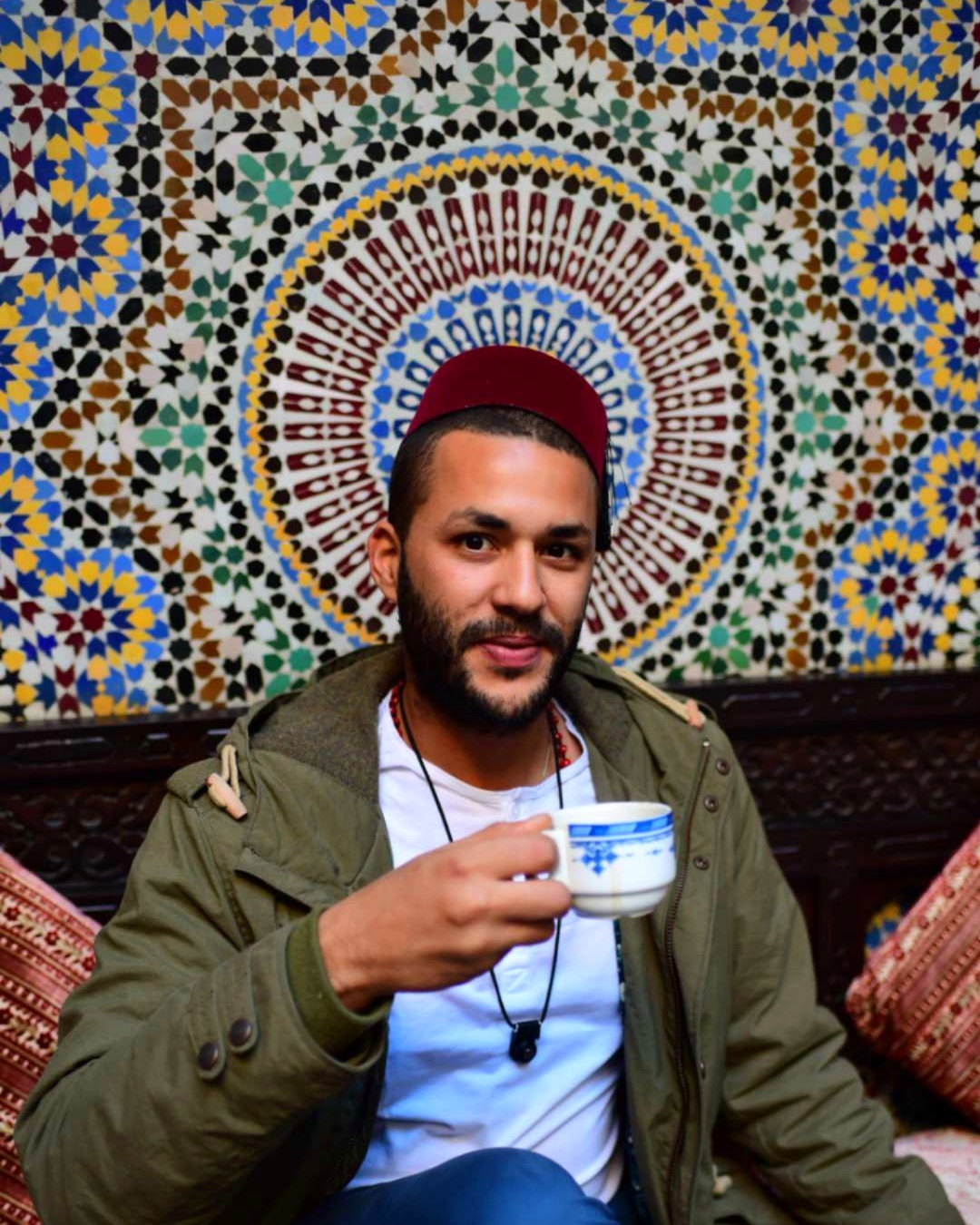 Reda, licensed Casablanca guide, with a glass of mint tea