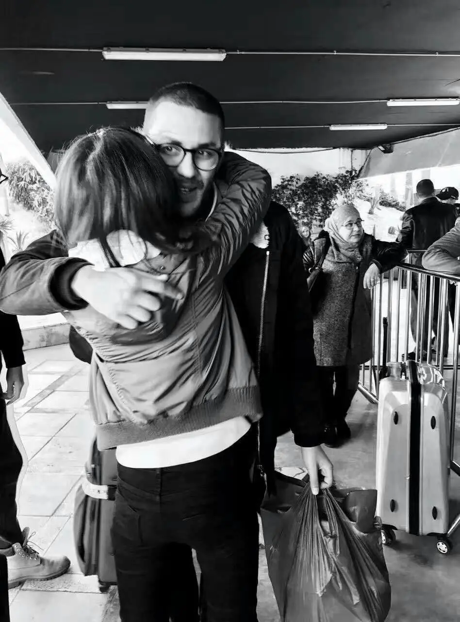 Reda saying goodbye to a guest after a tour